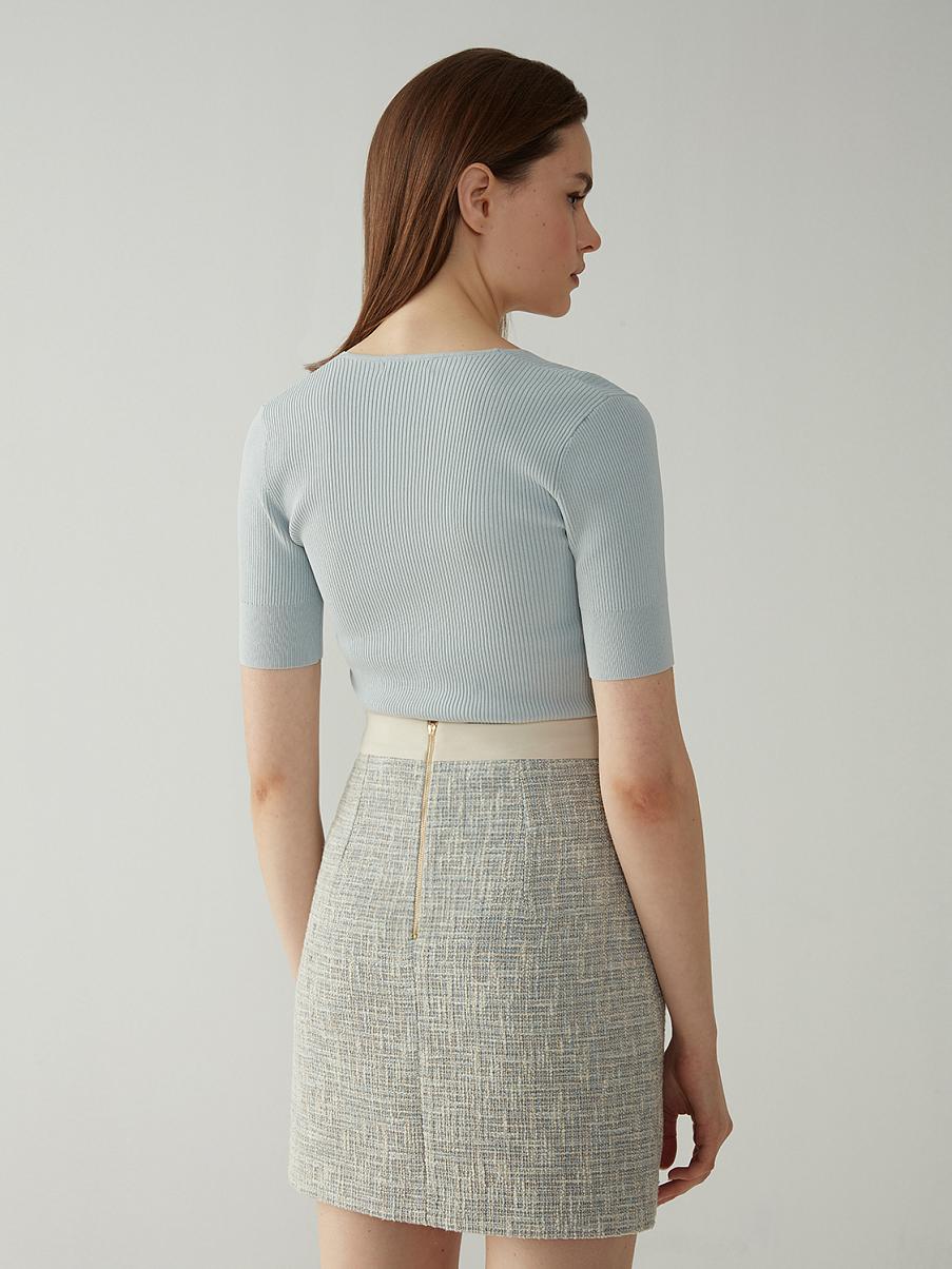 Твидовая юбка мини с декоративными карманами