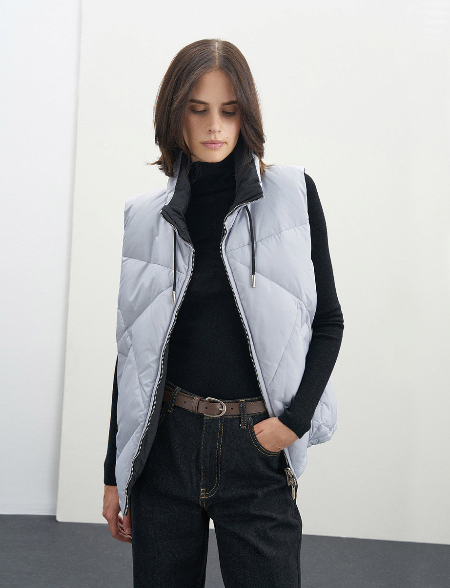 Двусторонняя жилетка с пухом и пером утки