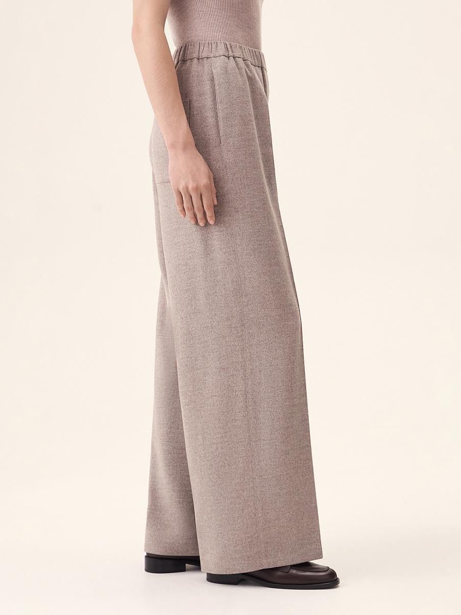 Брюки свободного кроя с поясом на резинке