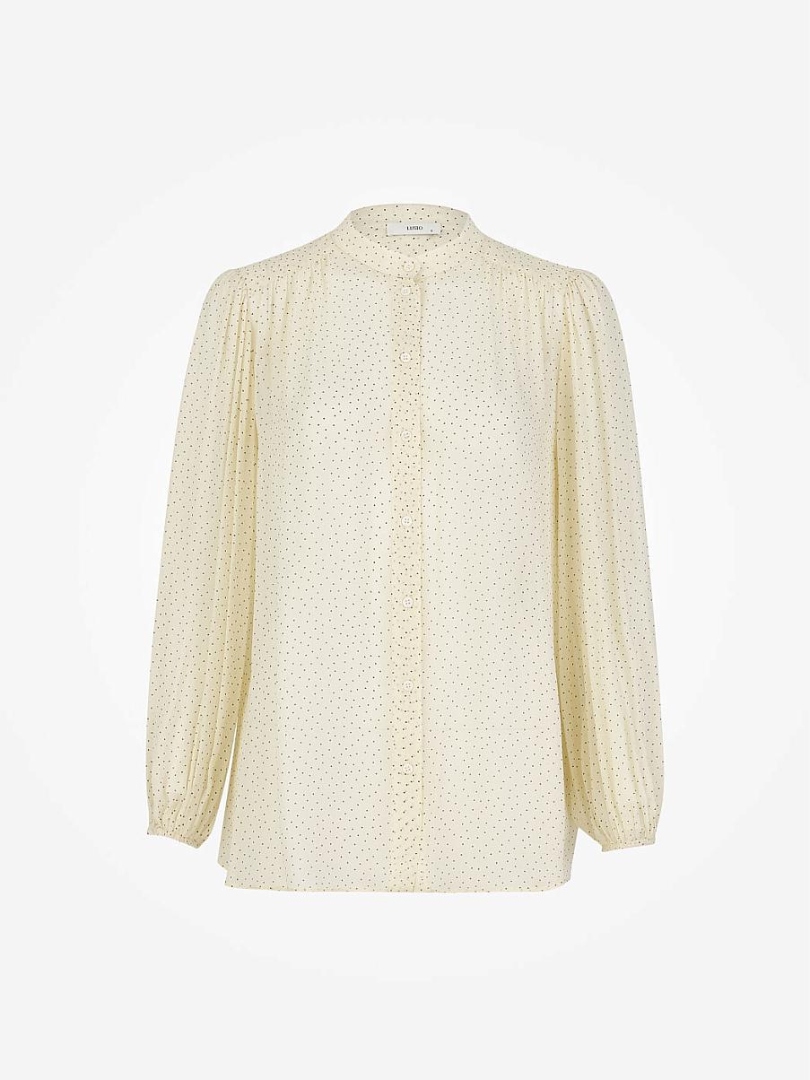 Блуза свободного кроя с узором в горошек
