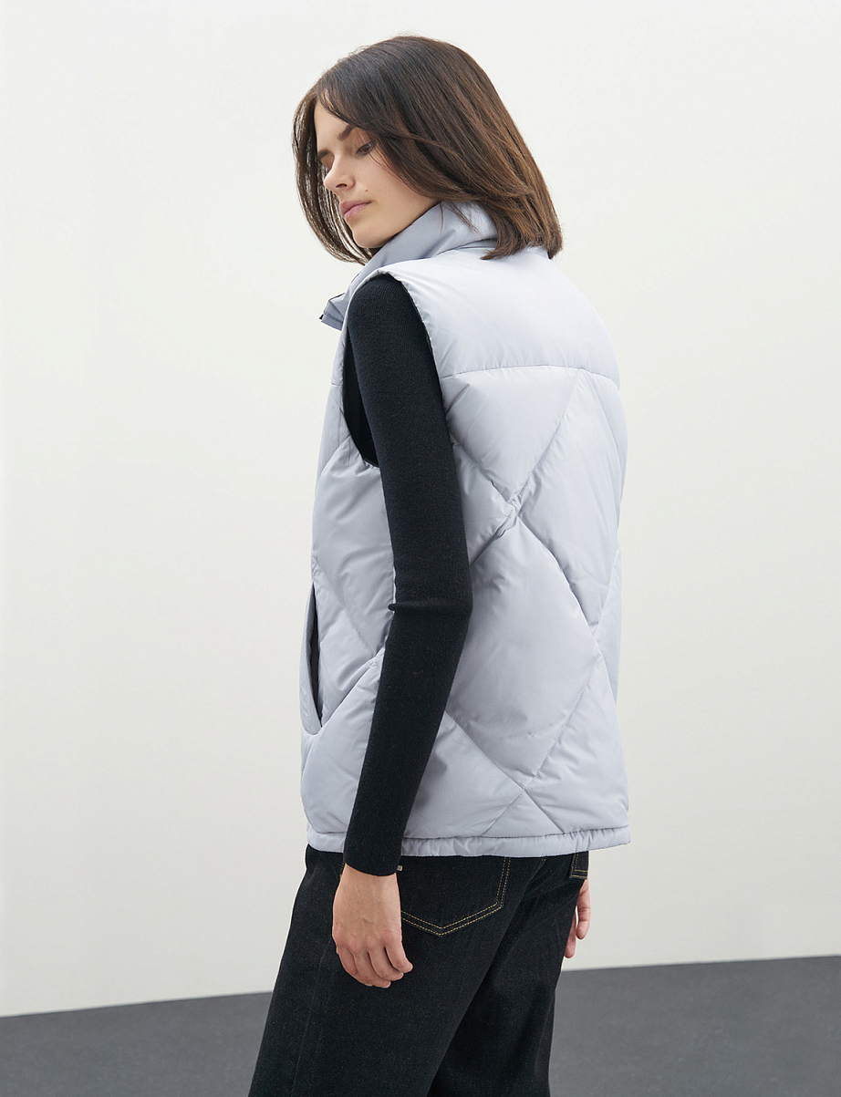 Двусторонняя жилетка с пухом и пером утки