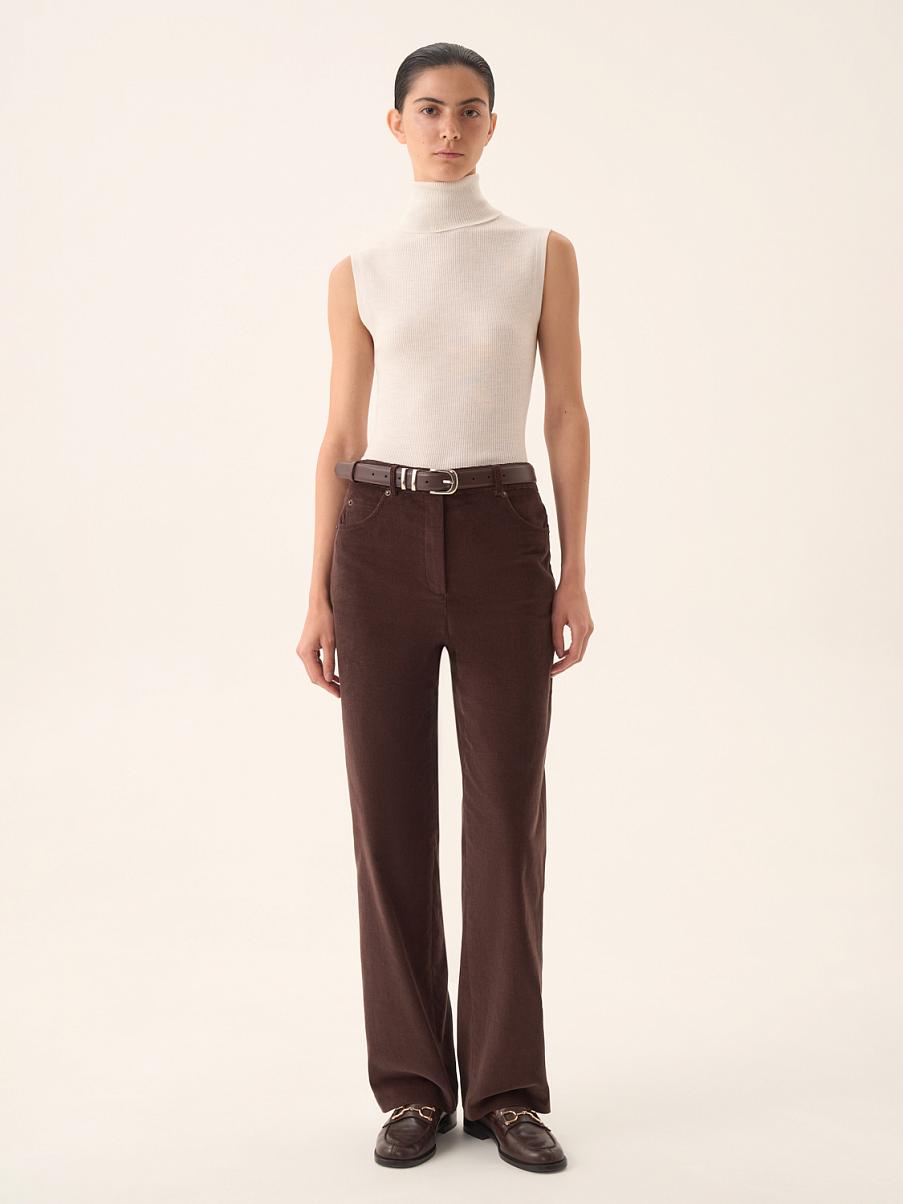 Водолазка без рукавов в рубчик