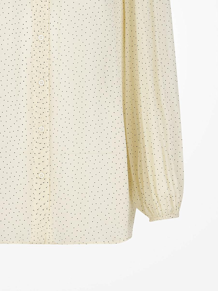 Блуза свободного кроя с узором в горошек