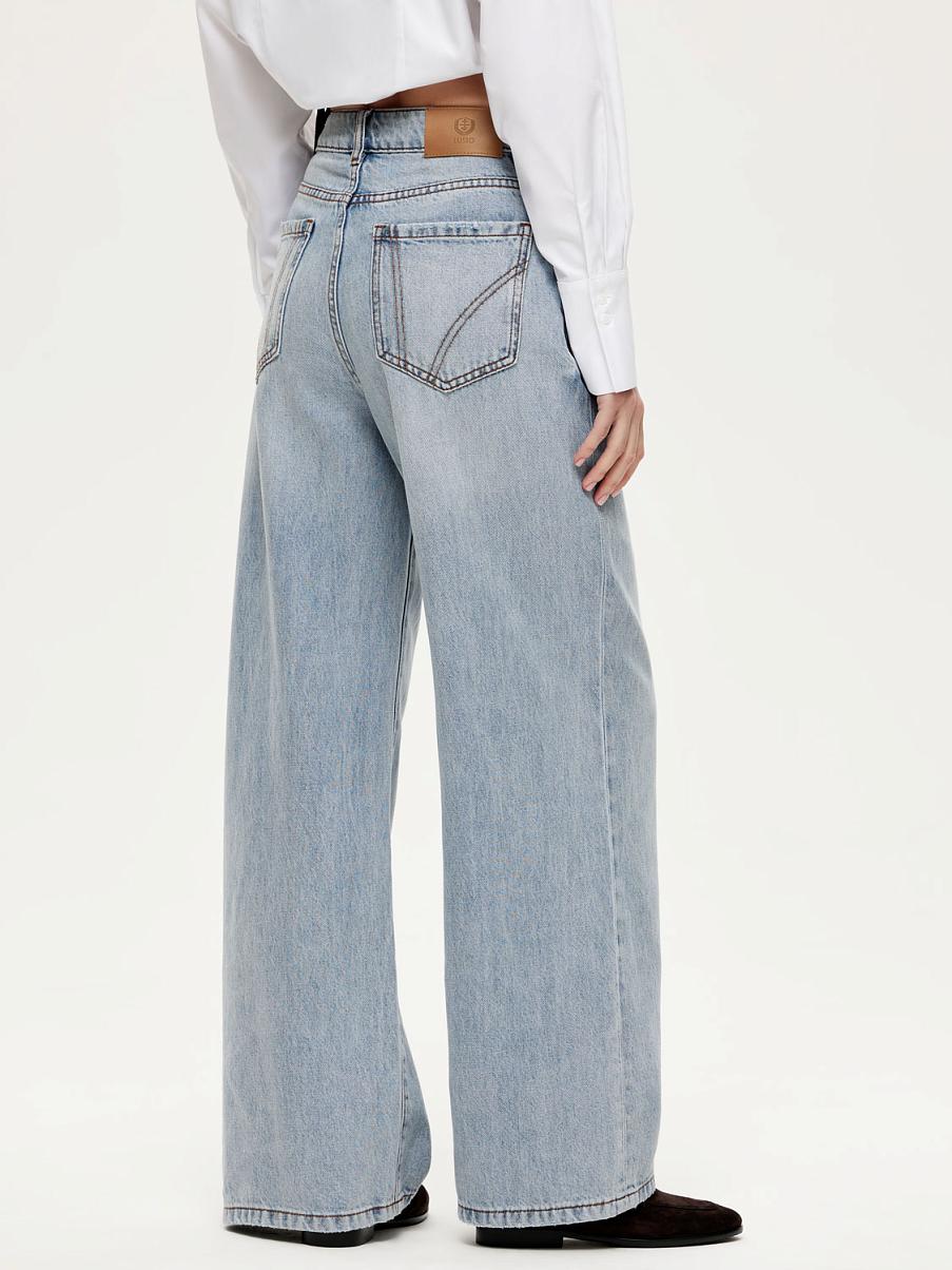 Хлопковые джинсы свободного кроя