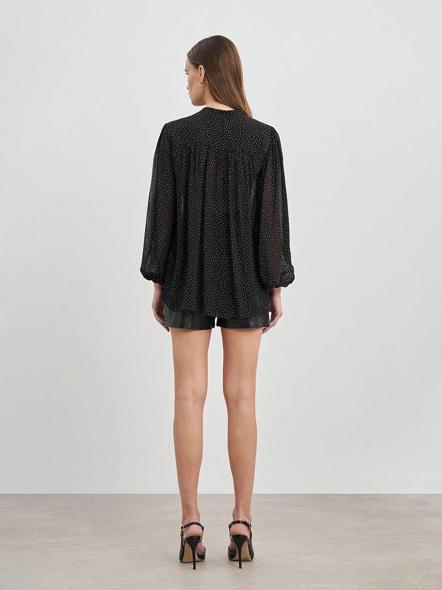 Блуза свободного кроя с узором в горошек