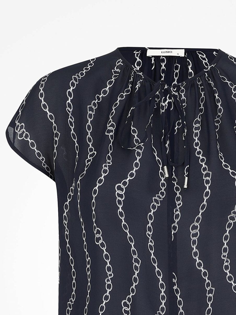 Блуза свободного кроя с коротким рукавом