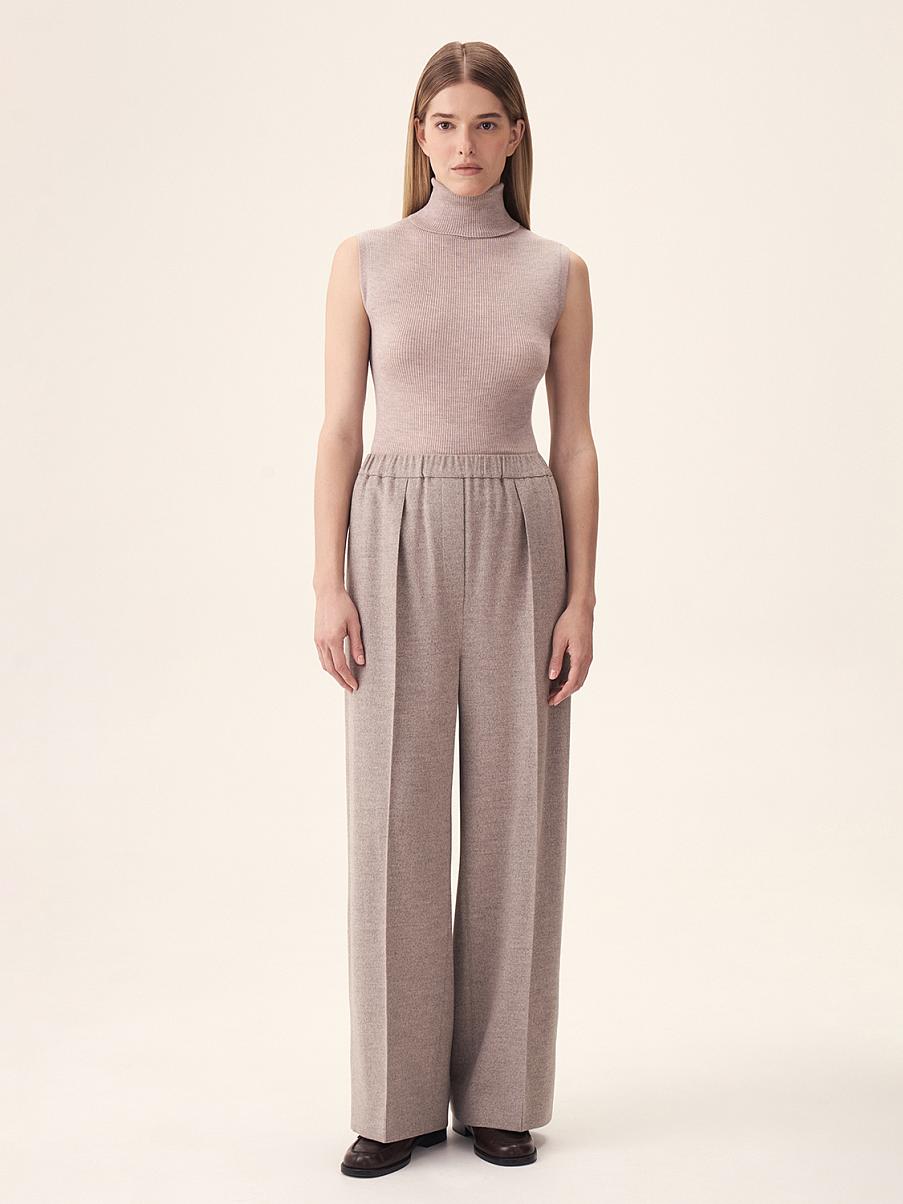 Брюки свободного кроя с поясом на резинке