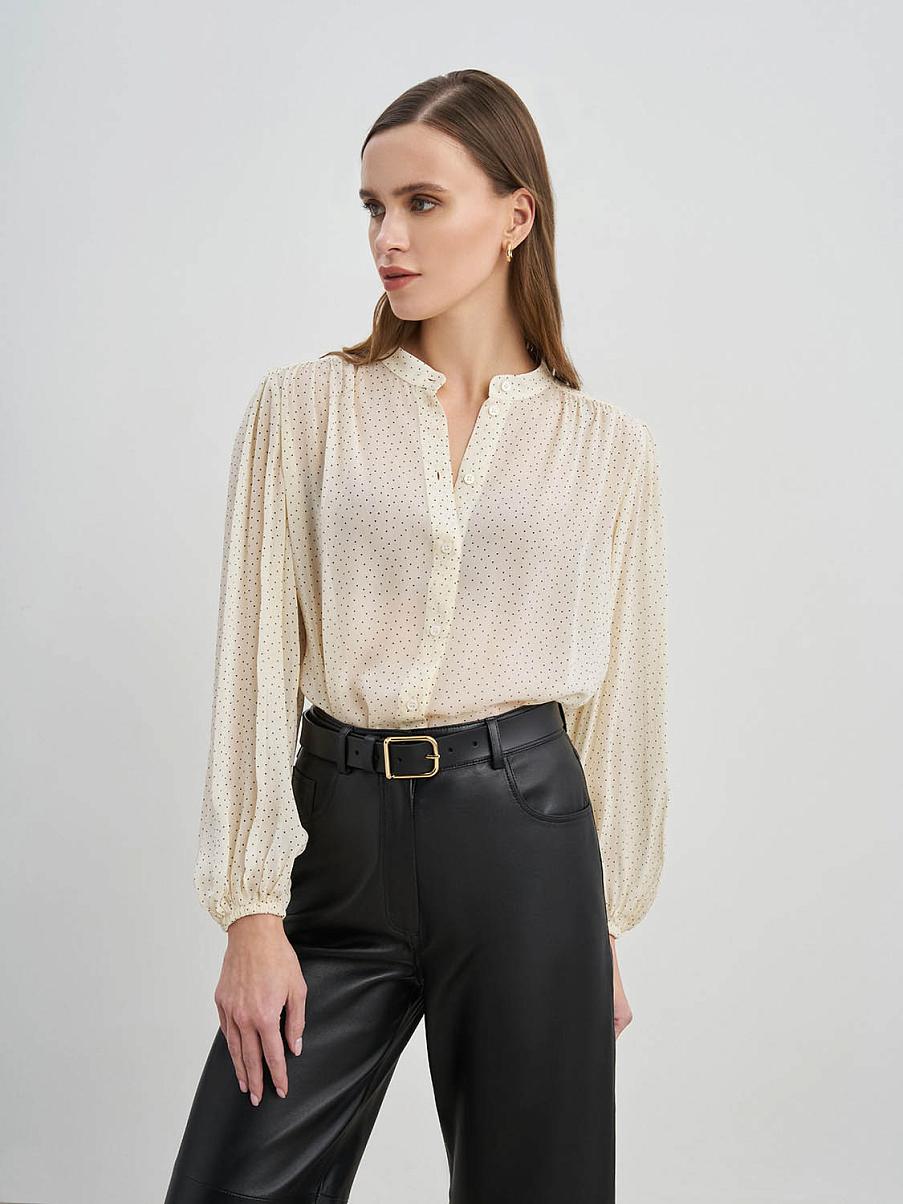 Блуза свободного кроя с узором в горошек