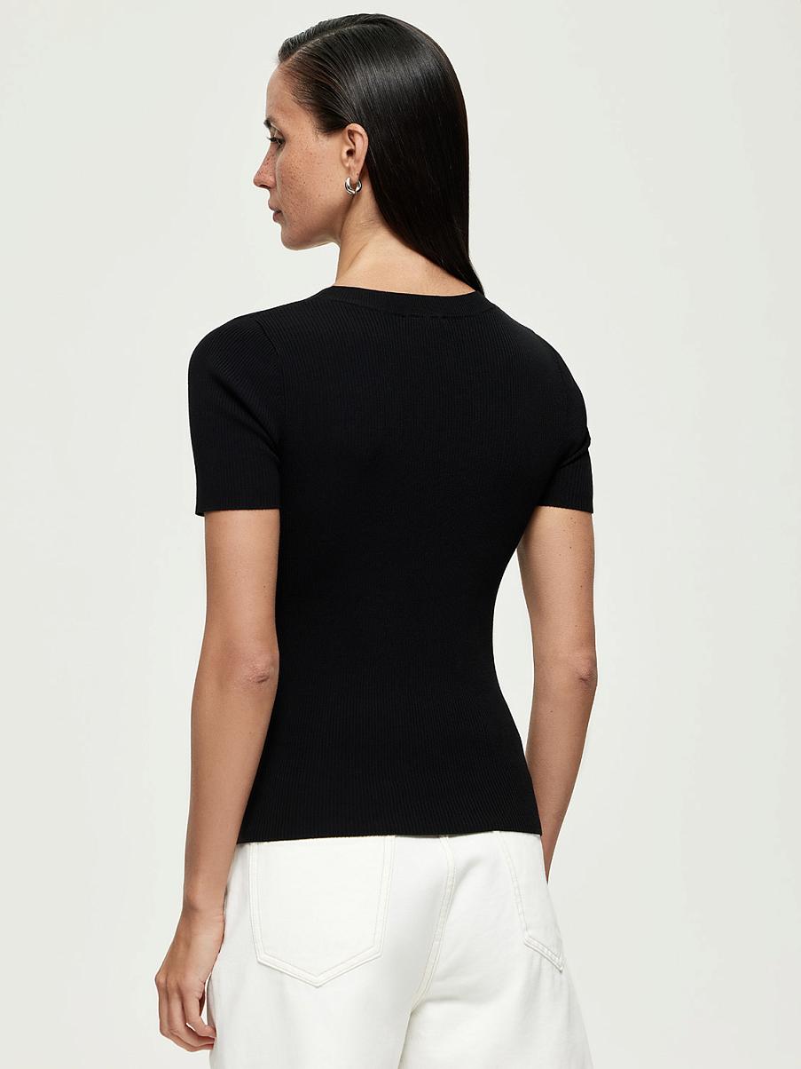 Трикотажная облегающая блуза в рубчик