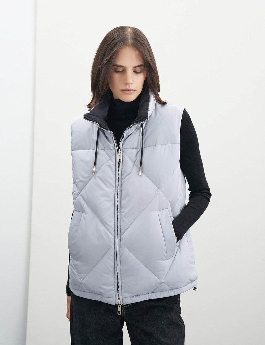 Двусторонняя жилетка с пухом и пером утки