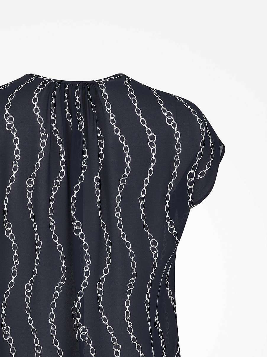 Блуза свободного кроя с коротким рукавом