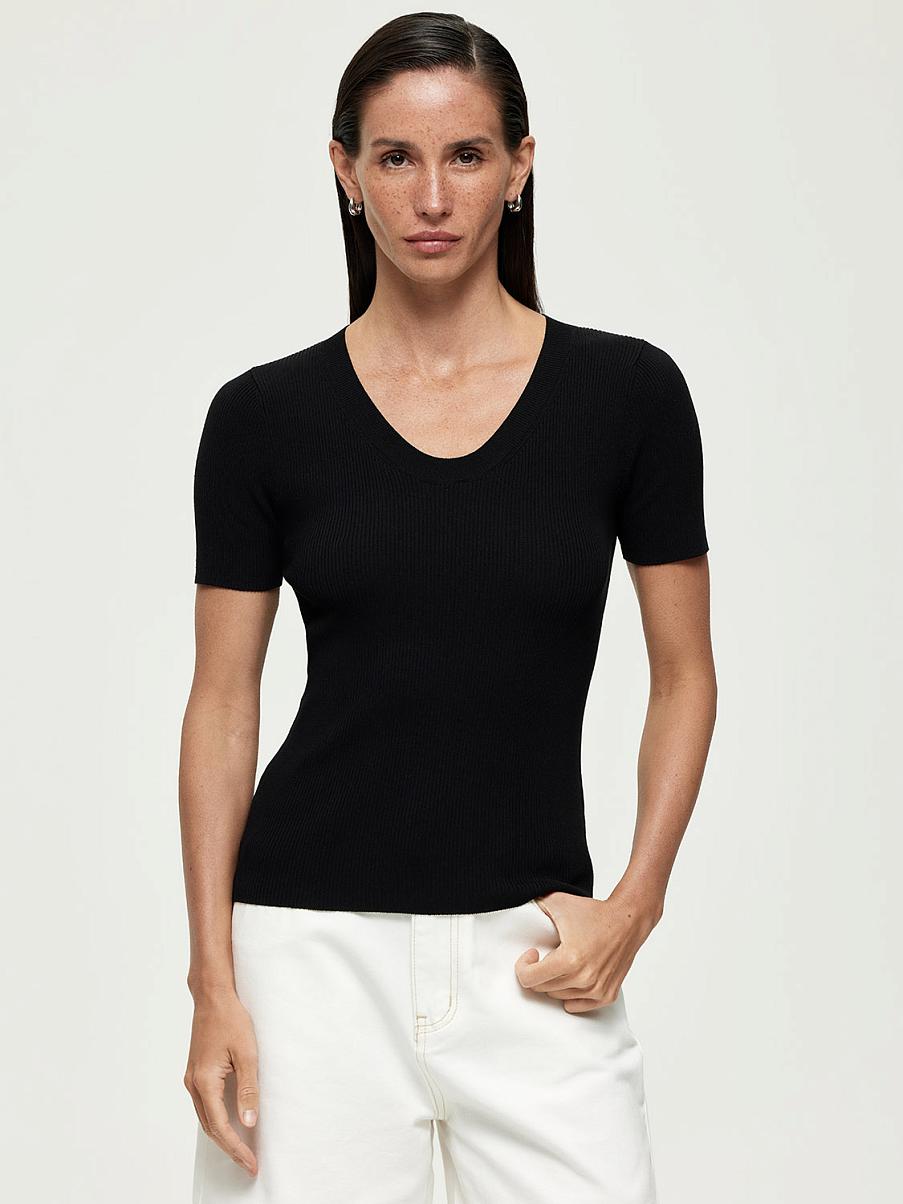 Трикотажная облегающая блуза в рубчик